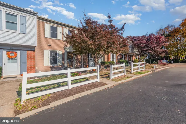 a view of a house with a park
