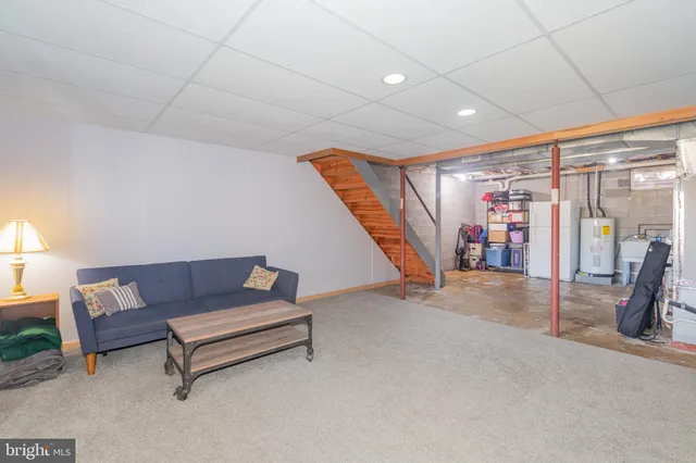 a view of a livingroom with furniture and a couch