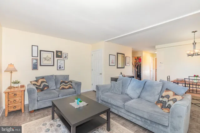 a living room with furniture and a couch