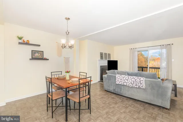 a bedroom with a bed and a table