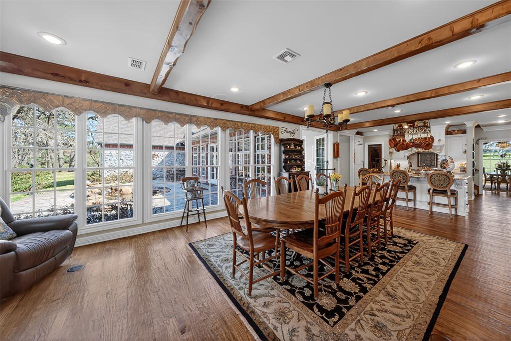 535 Riata Road Bullard, TX 75757 - Photo 11 of 40 a dining room with lots of furniture and wooden floor