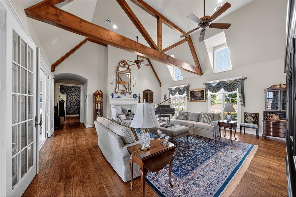 535 Riata Road Bullard, TX 75757 - Photo 5 of 40 a living room with furniture and wooden floor