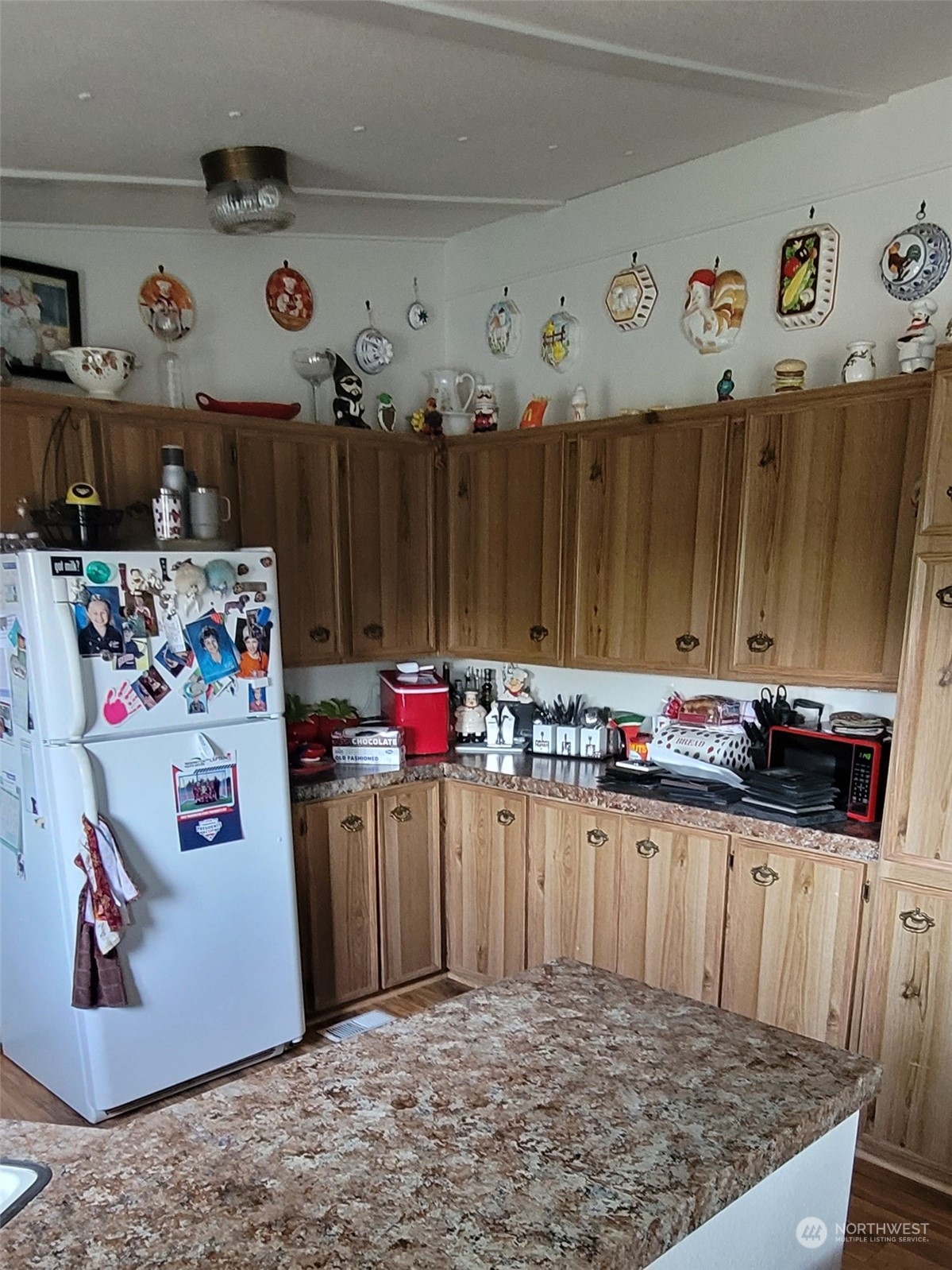 375 Union Avenue Southeast, Unit 36 Renton, WA 98059 - Photo 12 of 25 a view of a kitchen with a refrigerator and a stove