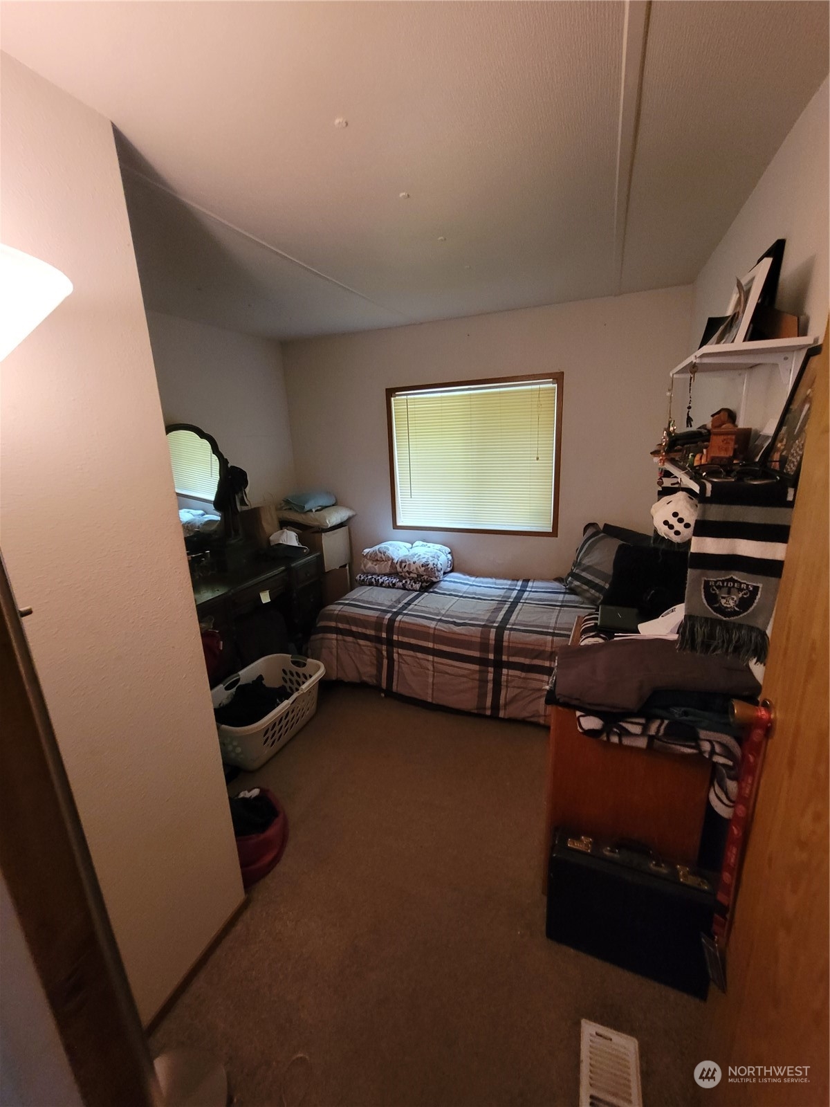 375 Union Avenue Southeast, Unit 36 Renton, WA 98059 - Photo 17 of 25 a living room with furniture and a flat screen tv