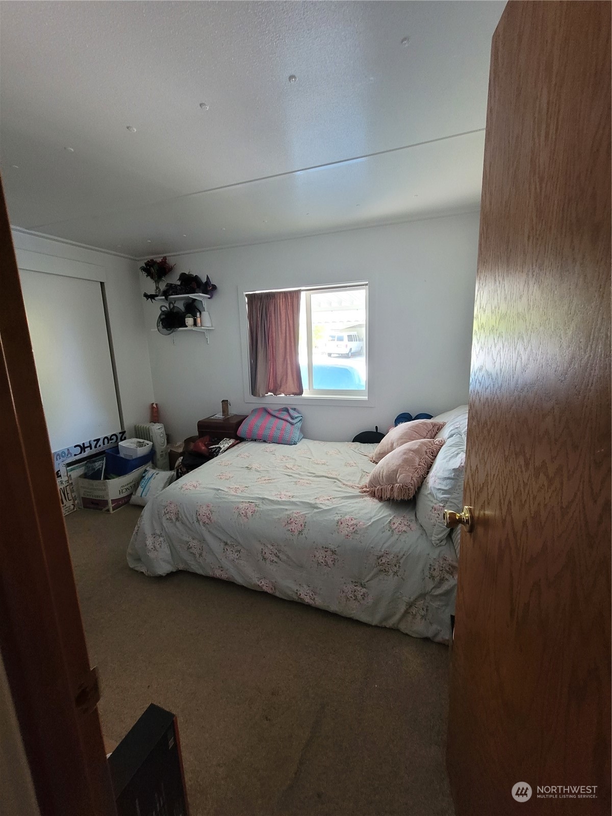 375 Union Avenue Southeast, Unit 36 Renton, WA 98059 - Photo 18 of 25 a bedroom with a bed and window