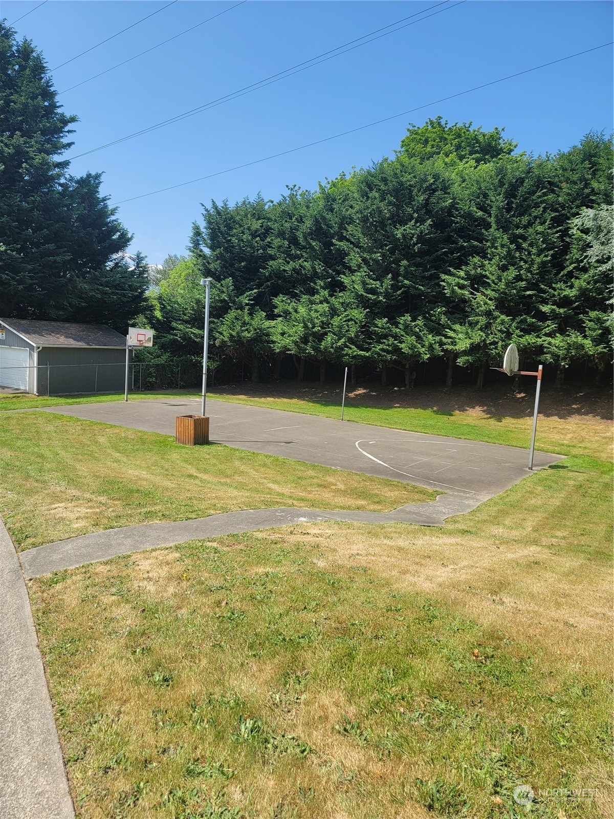 375 Union Avenue Southeast, Unit 36 Renton, WA 98059 - Photo 25 of 25 a view of a swimming pool with an outdoor space and seating area