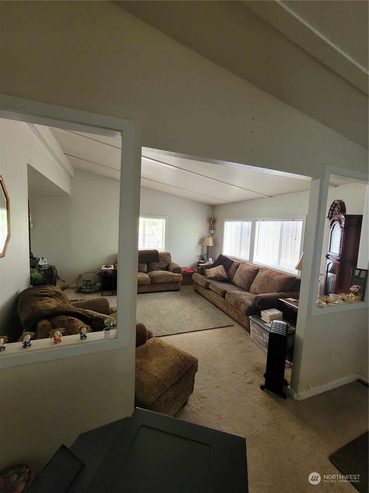 375 Union Avenue Southeast, Unit 36 Renton, WA 98059 - Photo 7 of 25 a living room with furniture and a flat screen tv