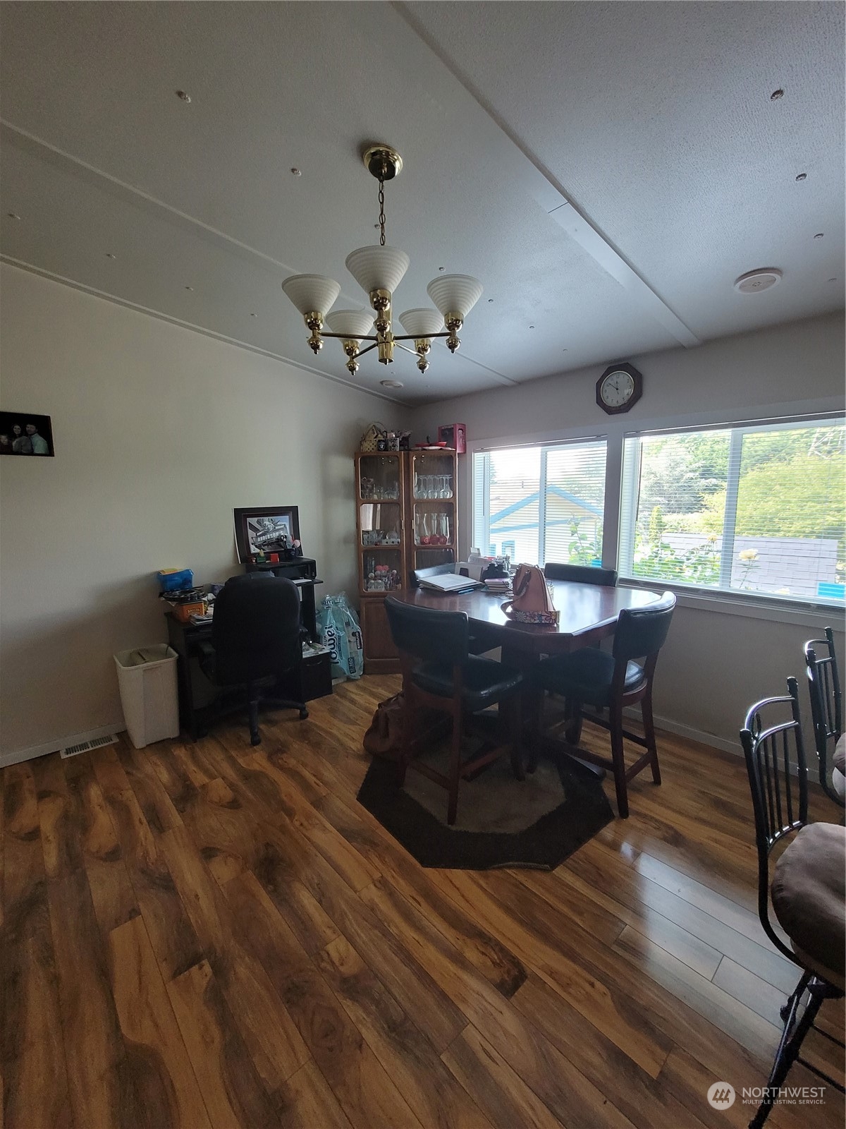 375 Union Avenue Southeast, Unit 36 Renton, WA 98059 - Photo 9 of 25 a living room with furniture large window and wooden floor