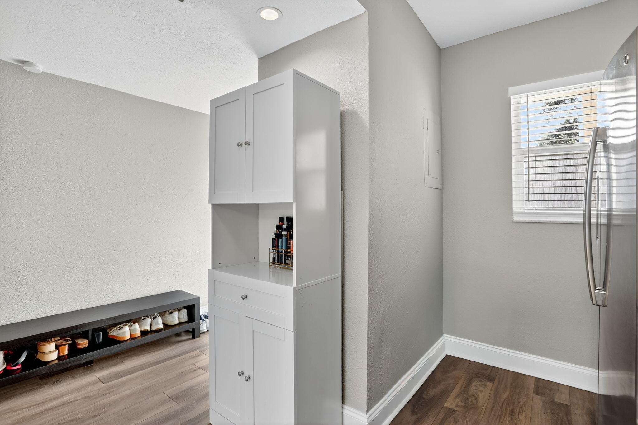 9450 Poinciana Place, Unit 203 Davie, FL 33324 - Photo 12 of 32 a kitchen with a refrigerator and a stove