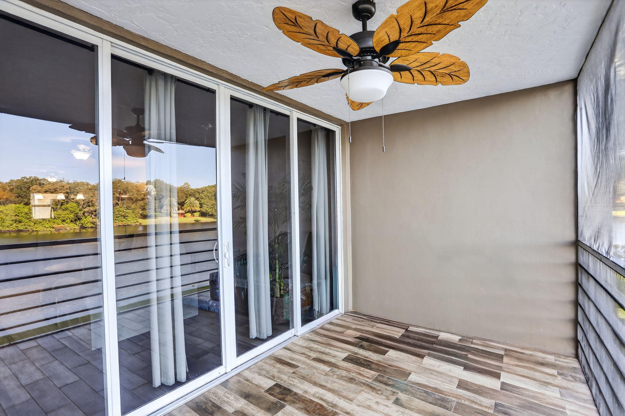 9450 Poinciana Place, Unit 203 Davie, FL 33324 - Photo 13 of 32 a view of balcony