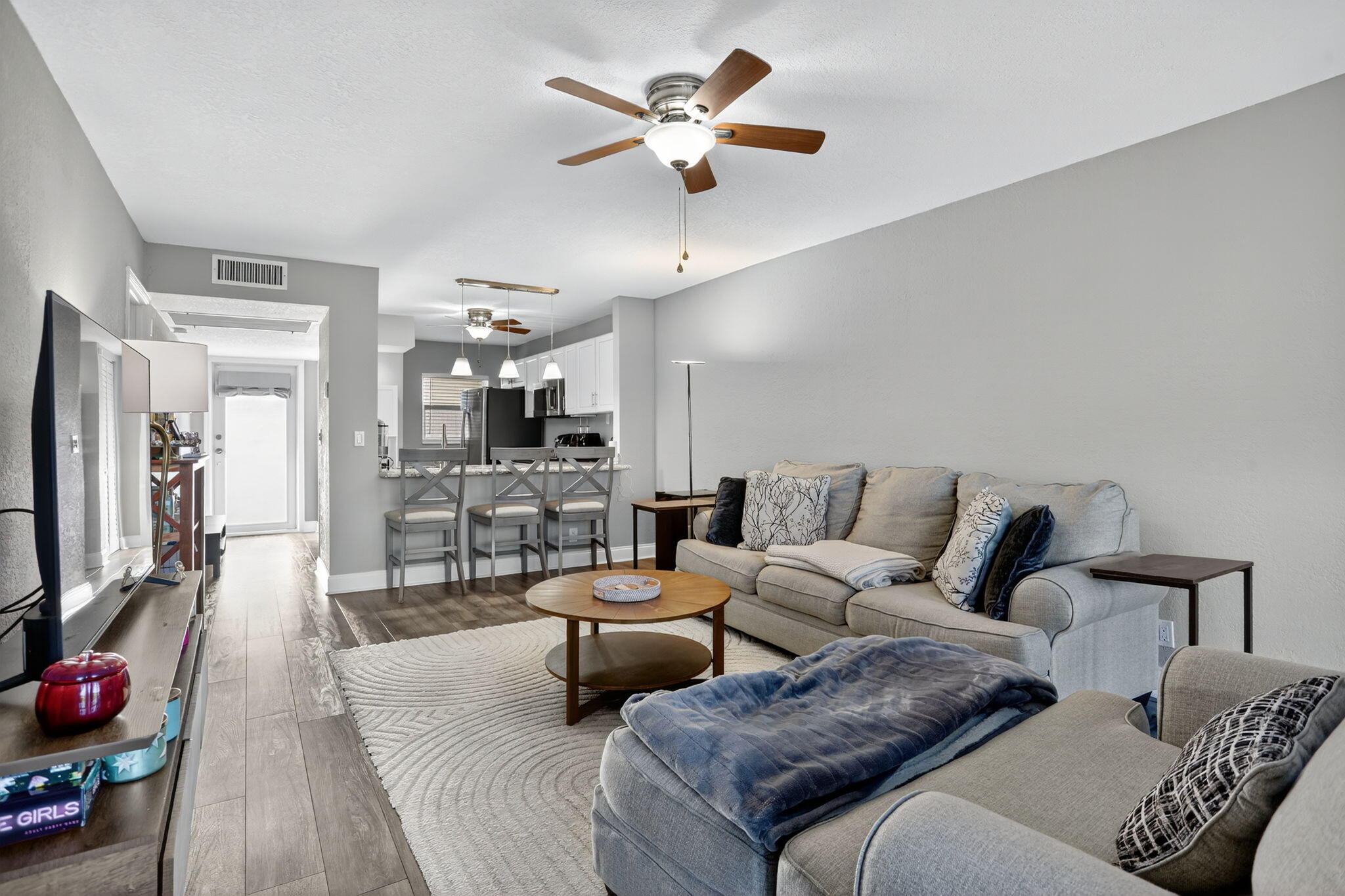 9450 Poinciana Place, Unit 203 Davie, FL 33324 - Photo 4 of 32 a living room with furniture