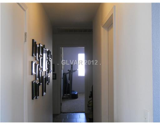 3601 North Solitude Road Las Vegas, NV 89108 - Photo 7 of 18 Other. Hall way to the bedrooms. which has tile.