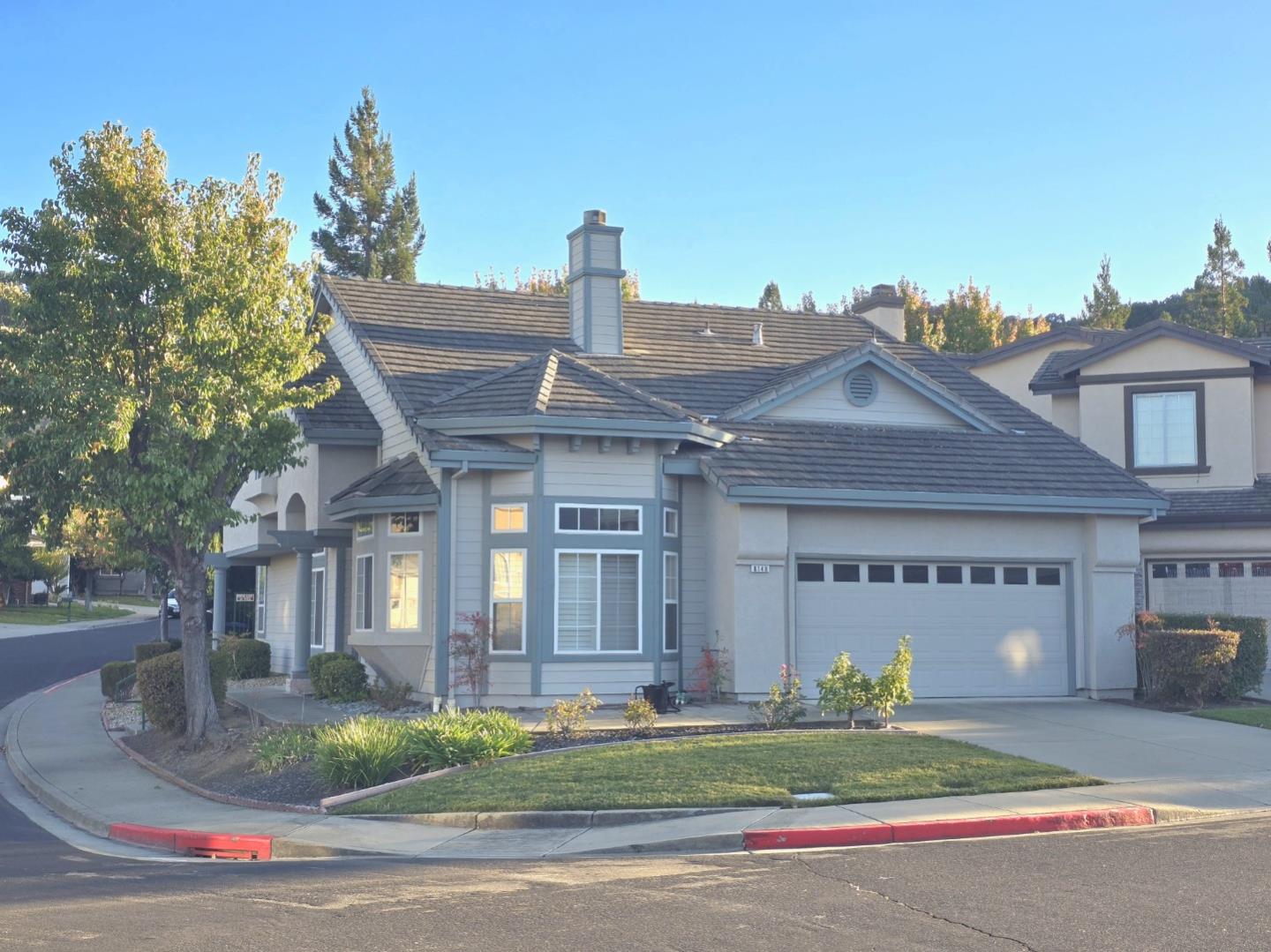 8148 Moller Ranch Drive Pleasanton, CA 94588 - Photo 1 of 1 a view of a house with a yard and garage