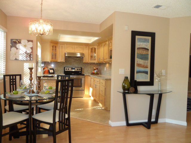 5233 Country Forge Lane San Jose, CA 95136 - Photo 11 of 25 a view of a dining room with furniture and chandelier