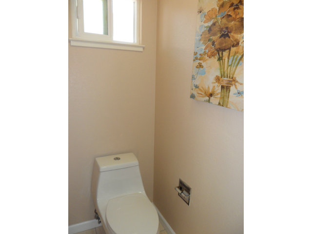 5233 Country Forge Lane San Jose, CA 95136 - Photo 17 of 25 a white toilet sitting next to a white walls