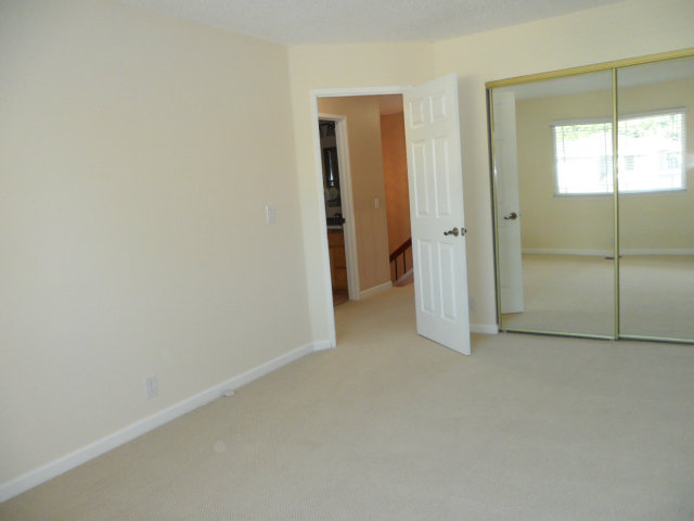 5233 Country Forge Lane San Jose, CA 95136 - Photo 19 of 25 an empty room with sliding door