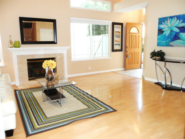 5233 Country Forge Lane San Jose, CA 95136 - Photo 2 of 25 a living room with furniture and a fireplace