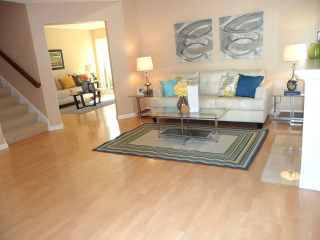 5233 Country Forge Lane San Jose, CA 95136 - Photo 3 of 25 a view of living room with furniture and a table