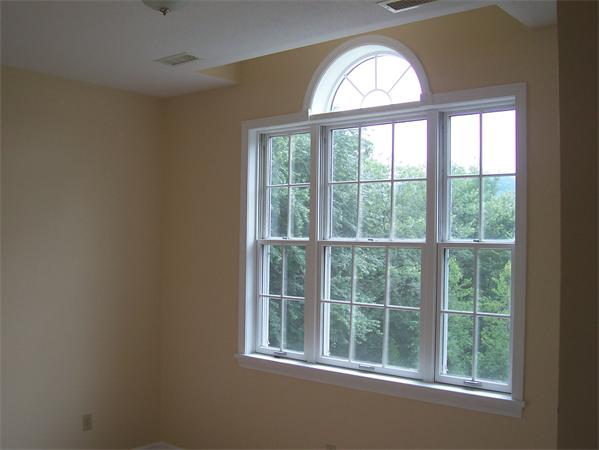 169 Scantic Road Hampden, MA 01036 - Photo 15 of 22 a view of a livingroom with a large window and wooden floor