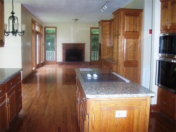 169 Scantic Road Hampden, MA 01036 - Photo 6 of 22 a view of a kitchen cabinets and a wooden floor