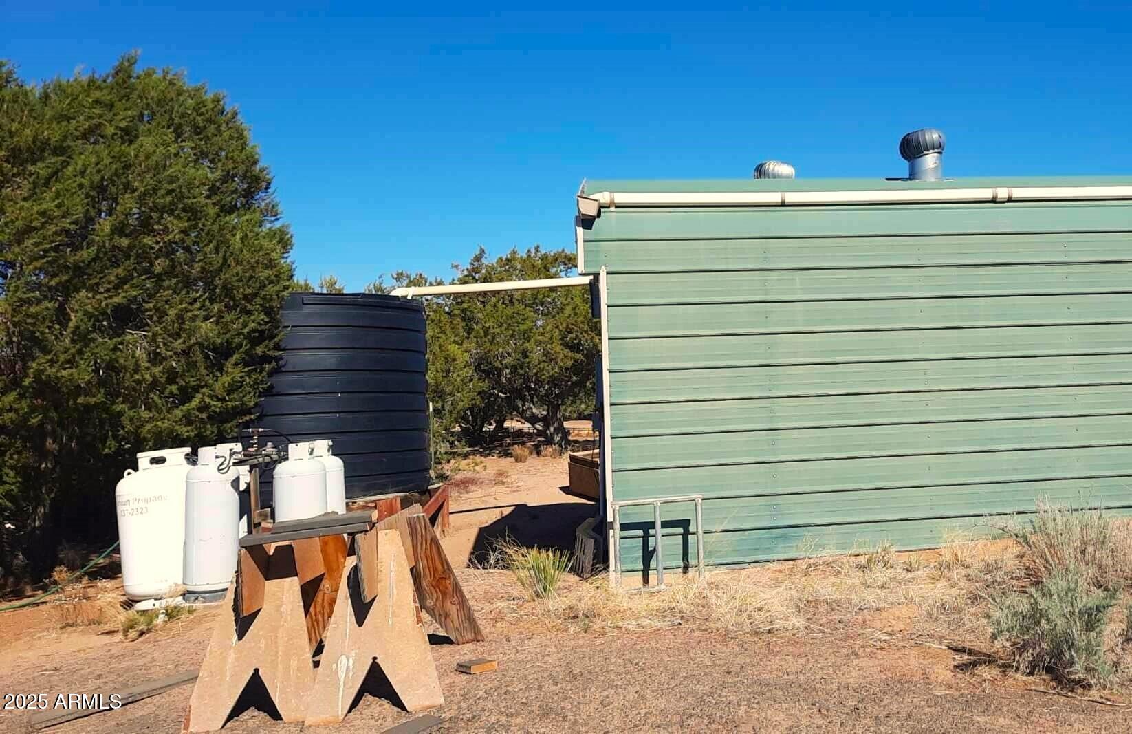 74 N7121 Red Sky Ranch St. Johns, AZ 85936 - Photo 10 of 65 a view of a back yard of the house