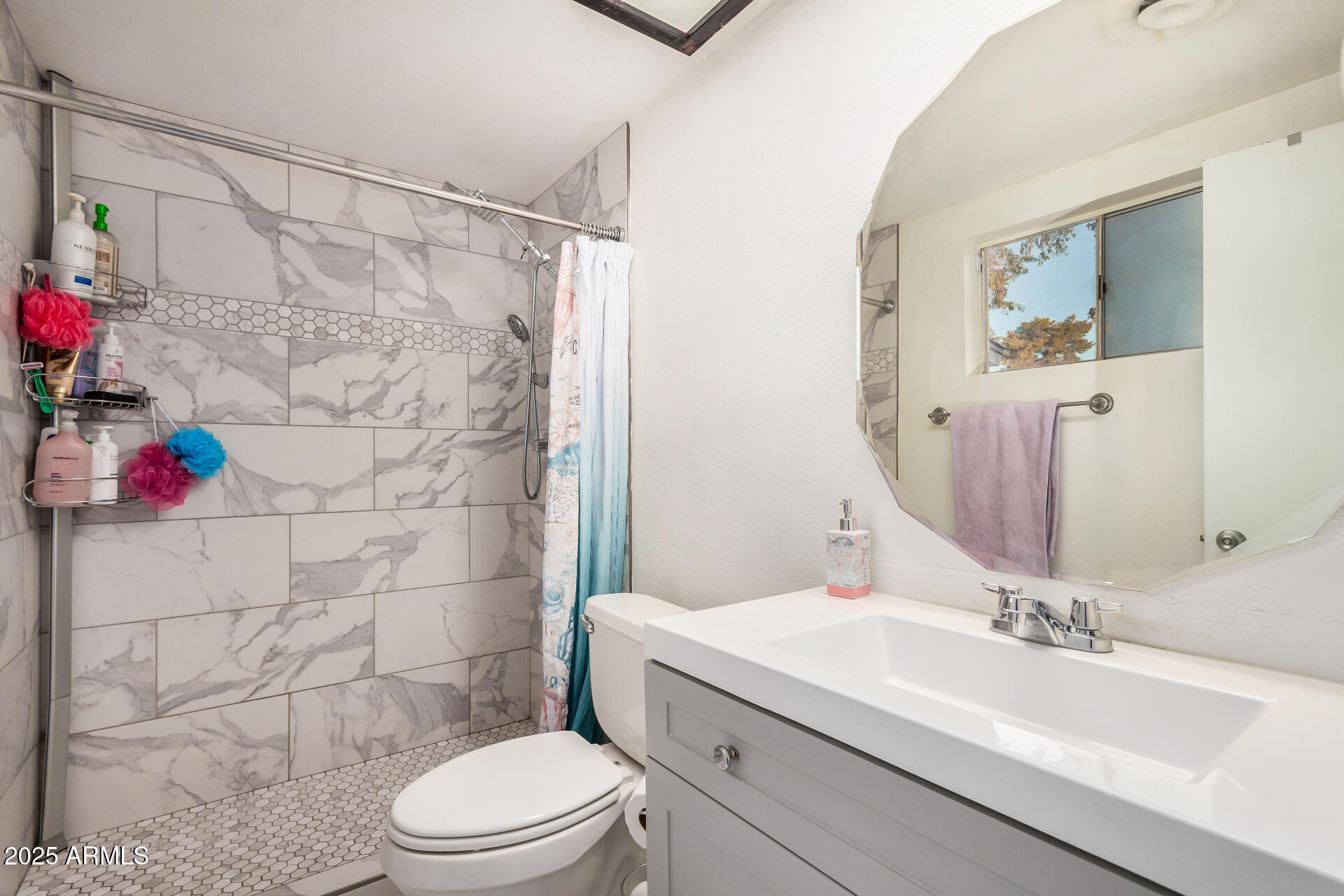 1634 West Villa Rita Drive Phoenix, AZ 85023 - Photo 11 of 47 a bathroom with a sink toilet vanity and shower