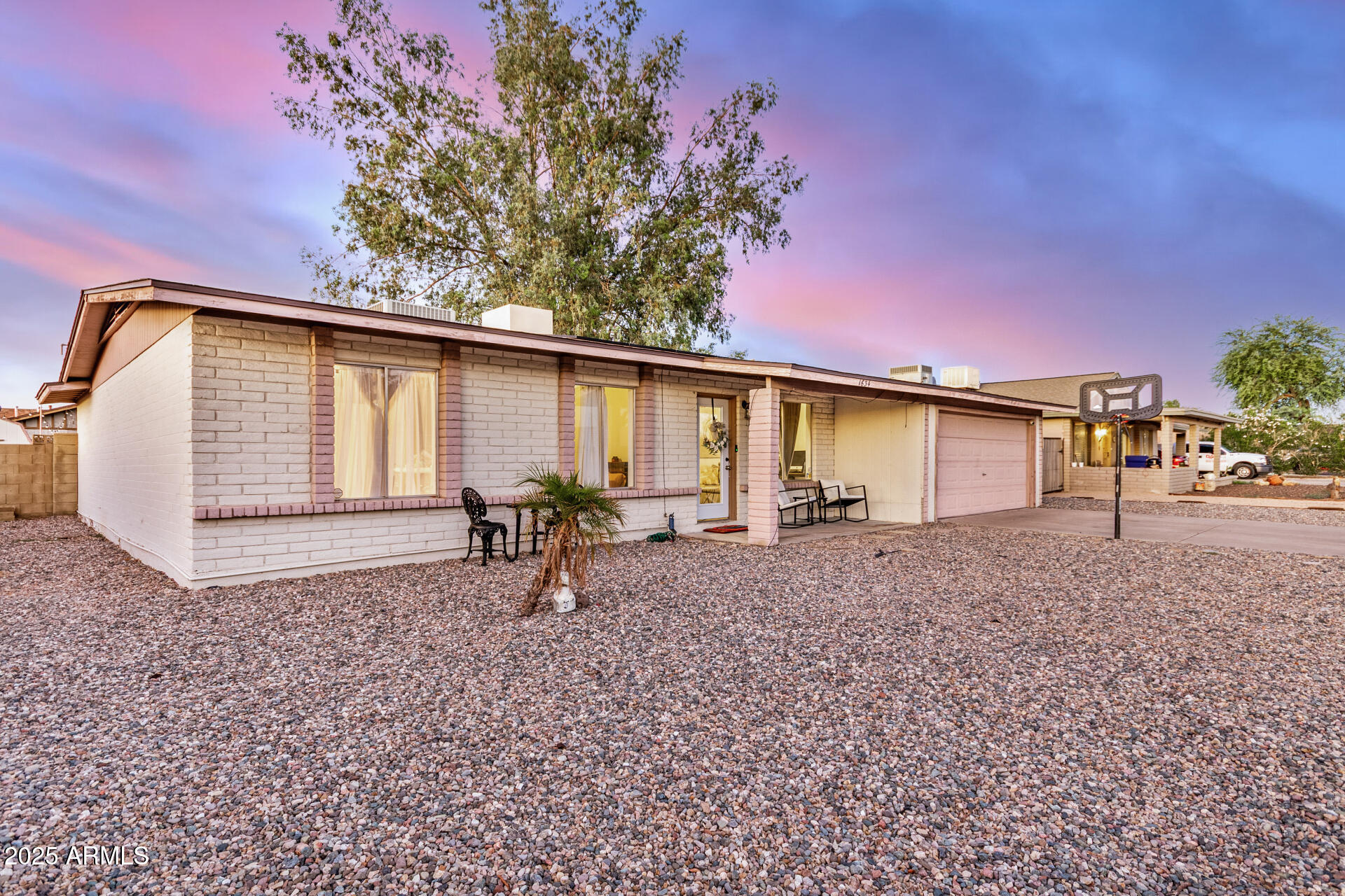 1634 West Villa Rita Drive Phoenix, AZ 85023 - Photo 12 of 47 a view of a house with backyard and a tree