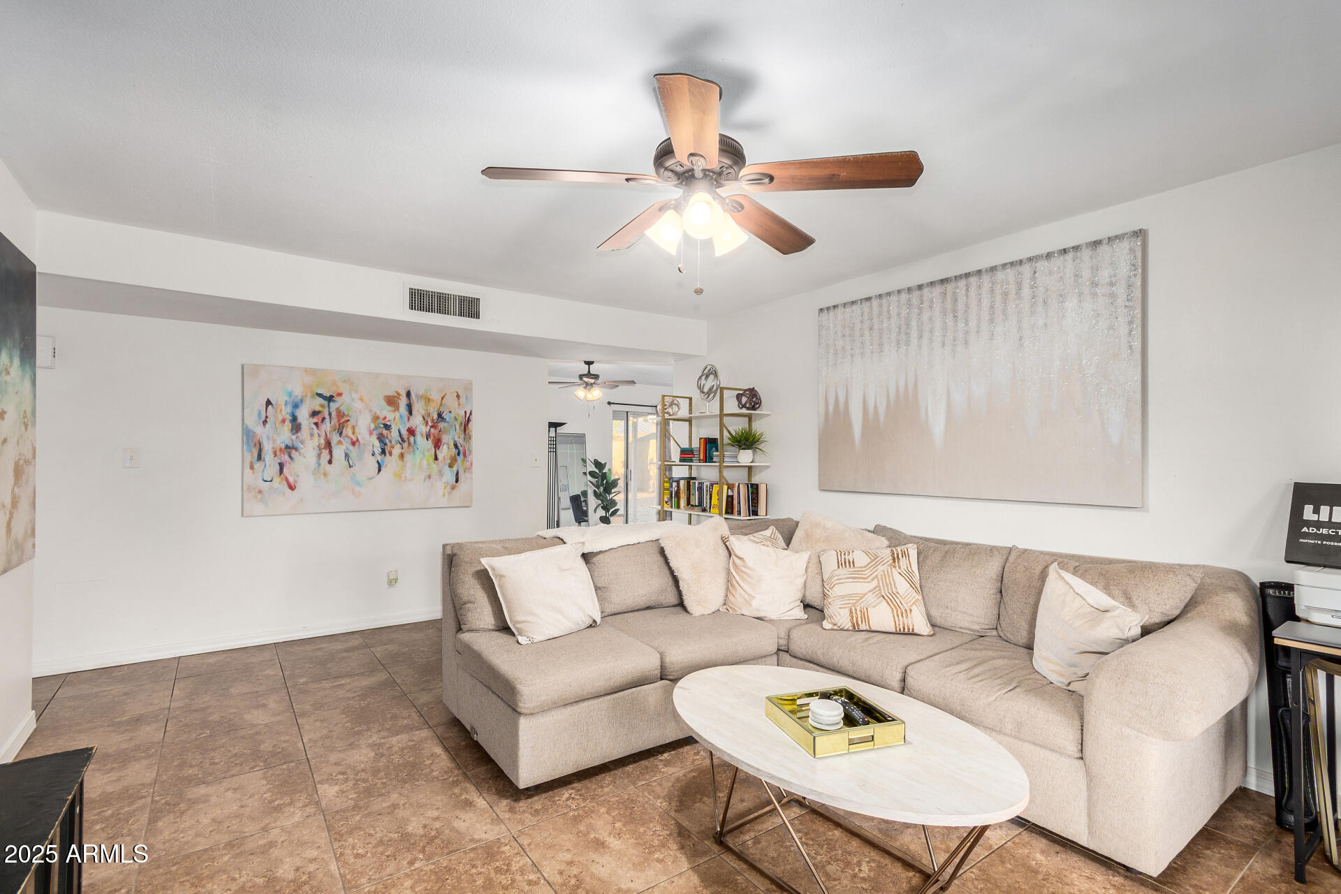1634 West Villa Rita Drive Phoenix, AZ 85023 - Photo 2 of 47 a living room with furniture and a large window