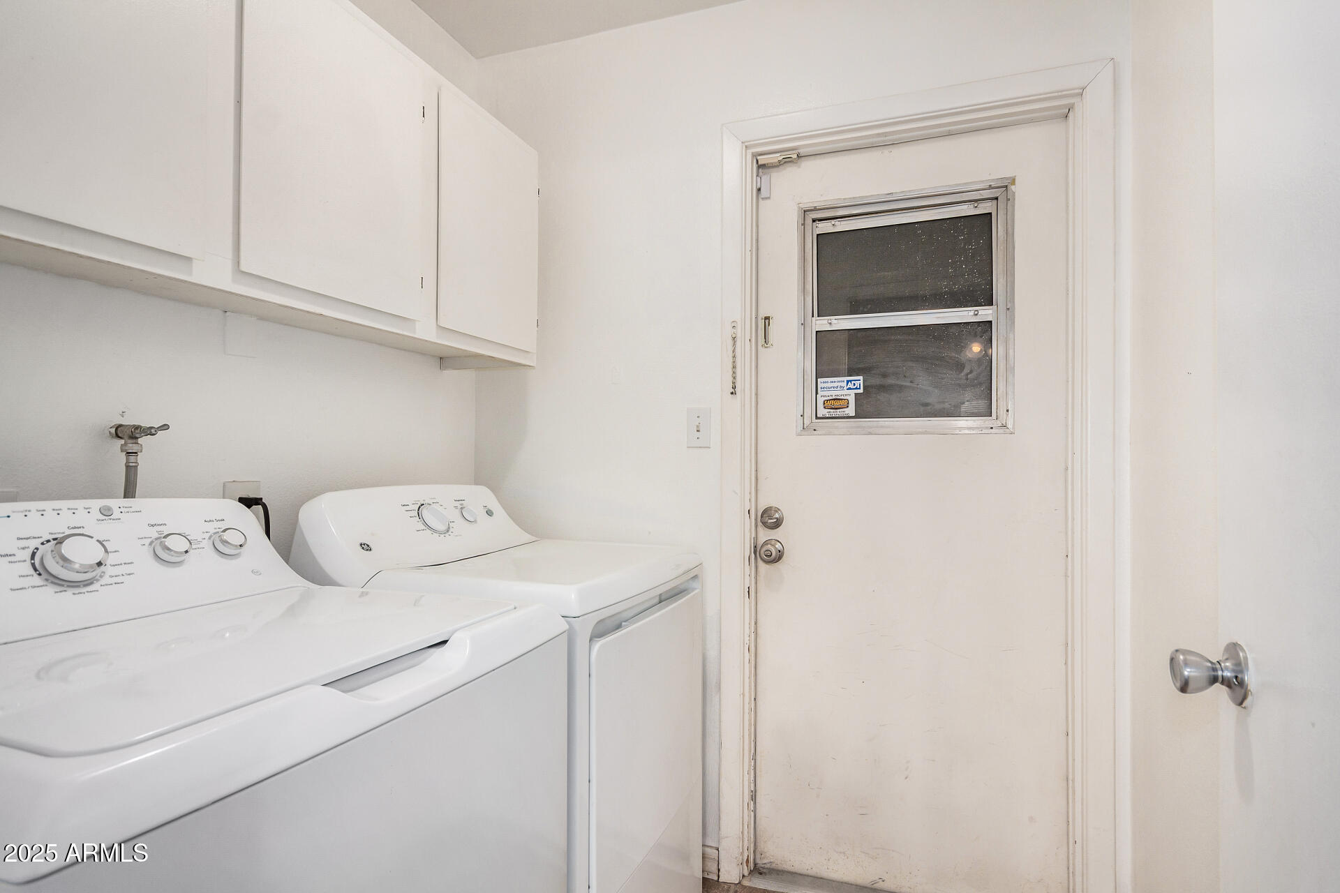 1634 West Villa Rita Drive Phoenix, AZ 85023 - Photo 37 of 47 a utility room with dryer and washer