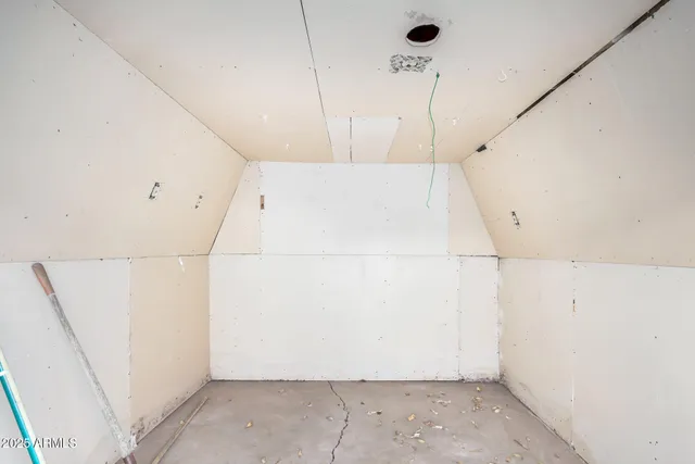 a bathroom with a tub and shower