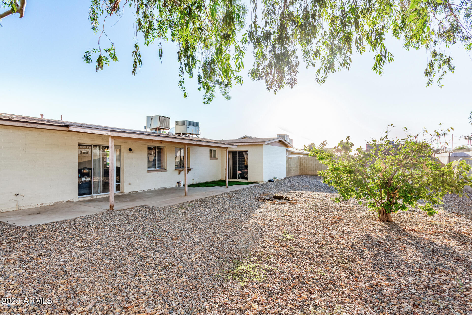 1634 West Villa Rita Drive Phoenix, AZ 85023 - Photo 45 of 47 a view of a house with a tree in the background