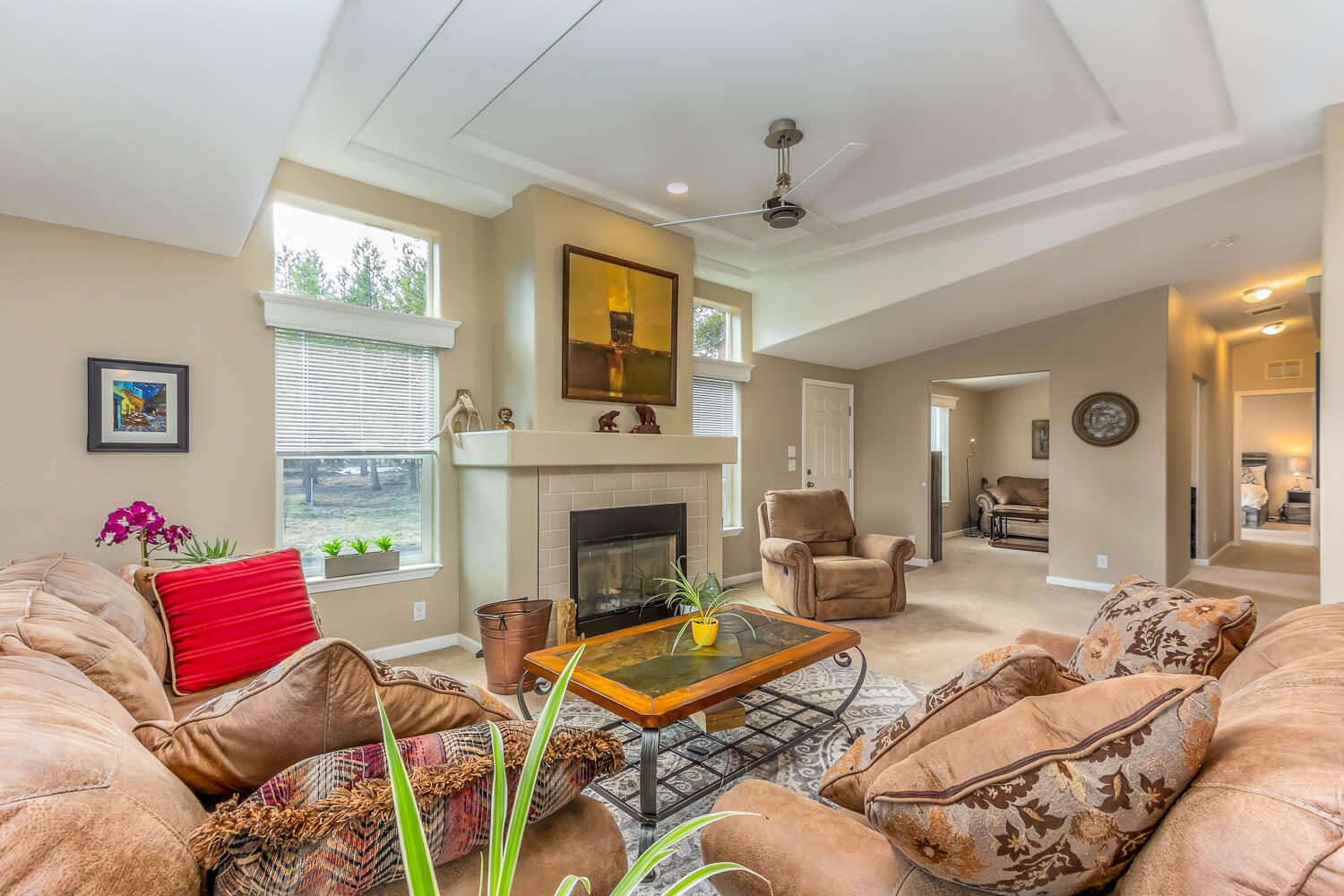 53981 Pine Grove Road La Pine, OR 97739 - Photo 7 of 41 living room features a beautiful wood burning fireplace. Lots of windows!