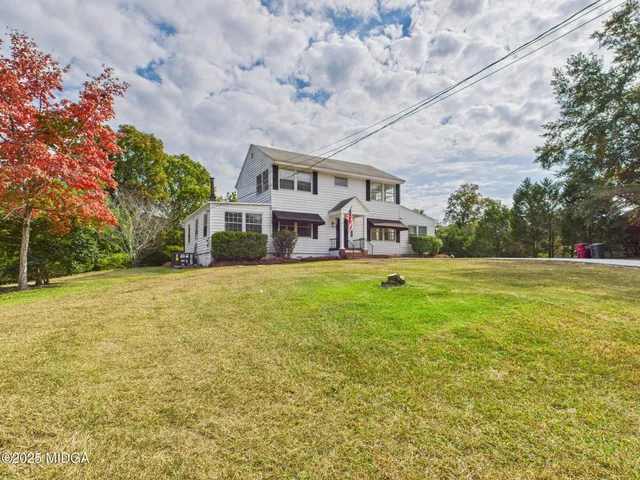 a front view of house with yard