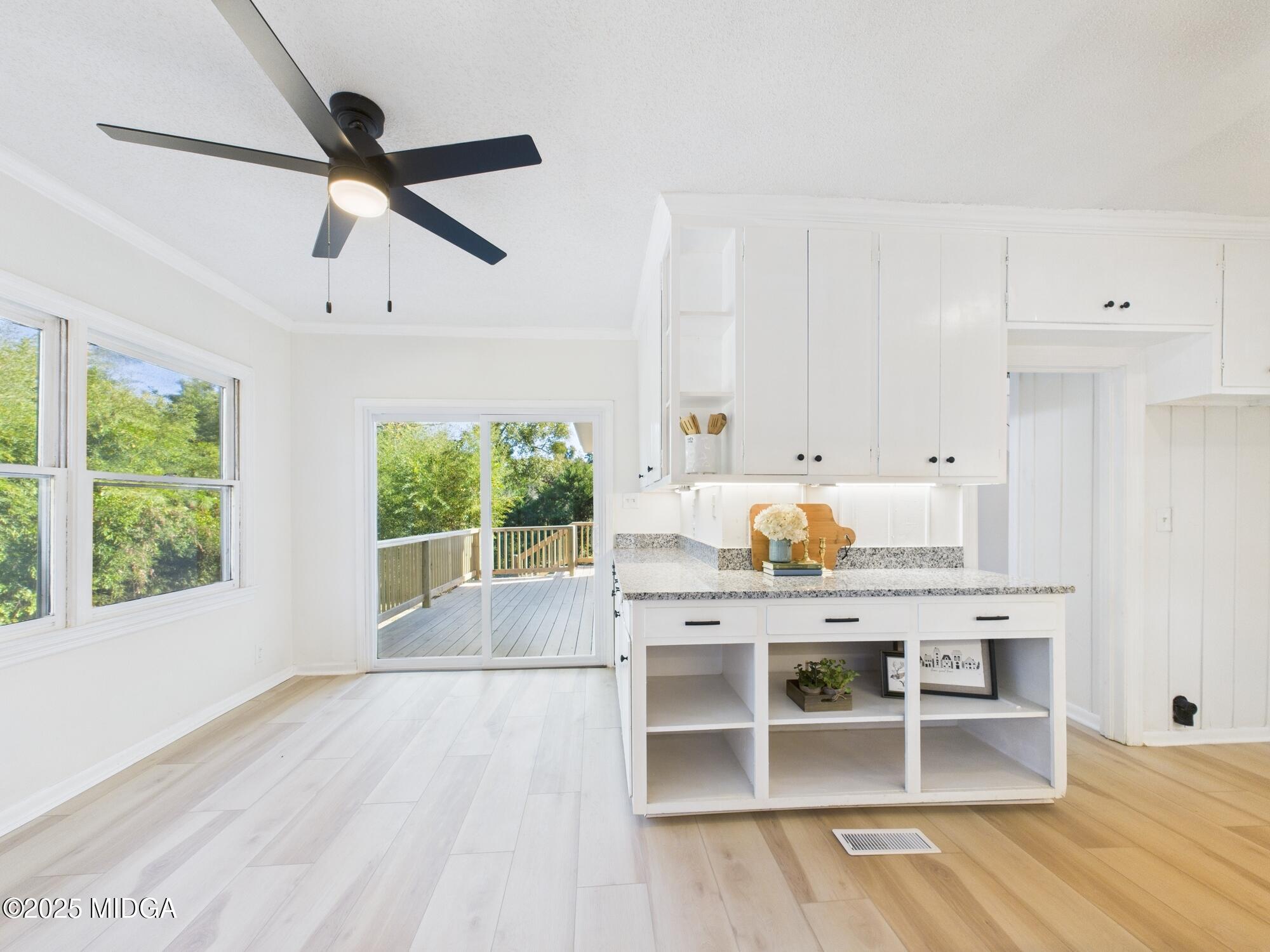 621 Forest Hill Road Macon, GA 31210 - Photo 12 of 50 a view of a livingroom with furniture window and wooden floor
