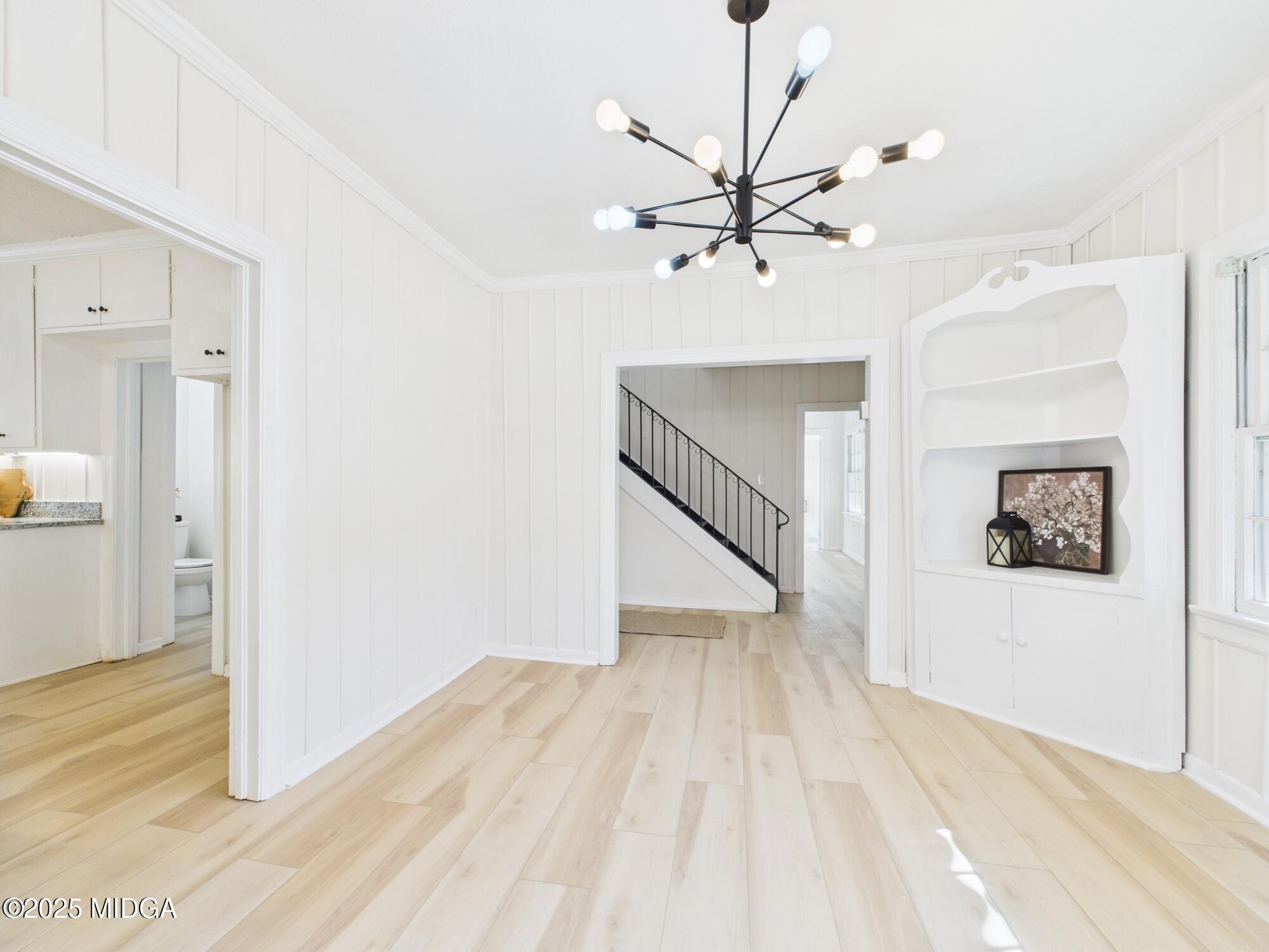 621 Forest Hill Road Macon, GA 31210 - Photo 15 of 50 a view of a hallway with wooden floor and closet