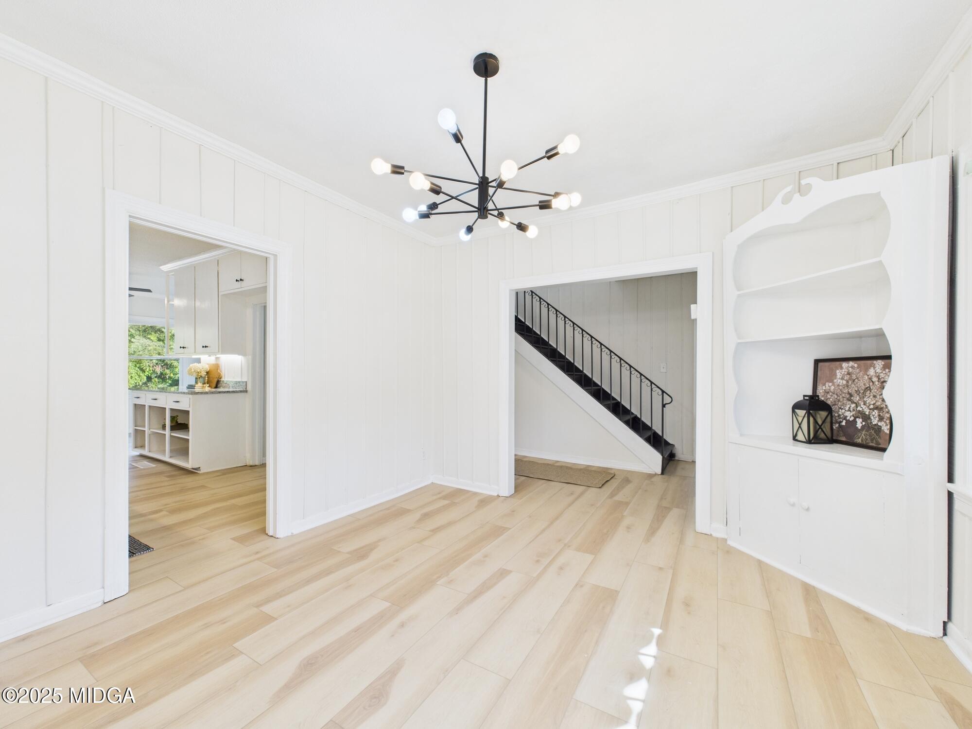 621 Forest Hill Road Macon, GA 31210 - Photo 16 of 50 a view of an entryway with a chandelier