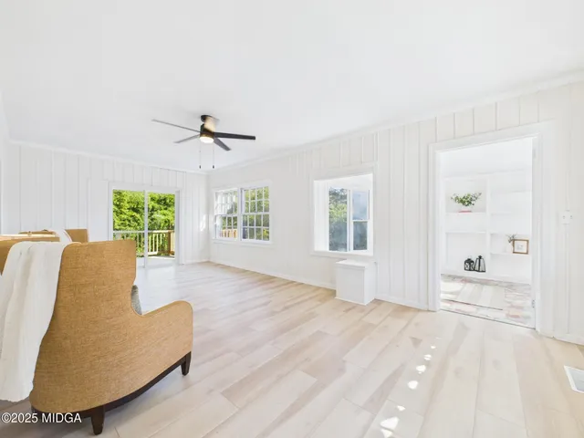a view of a bathroom from the hallway