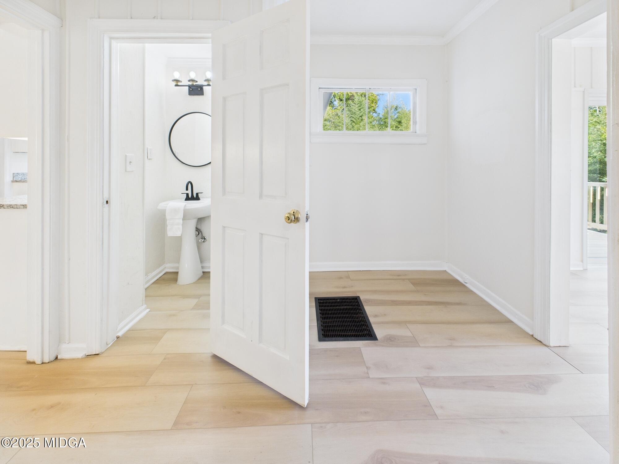 621 Forest Hill Road Macon, GA 31210 - Photo 22 of 50 a view of a bathroom from the hallway