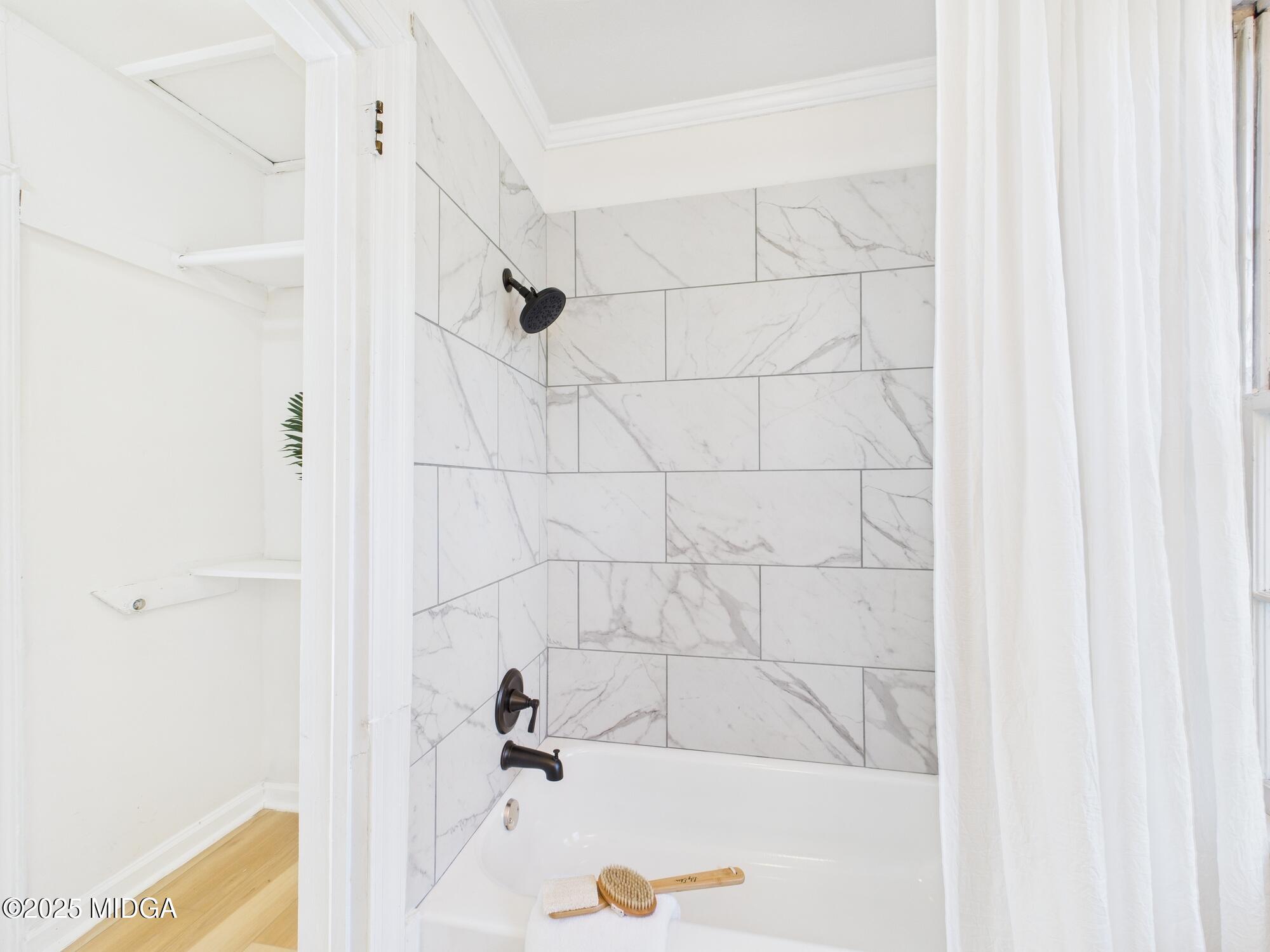 621 Forest Hill Road Macon, GA 31210 - Photo 30 of 50 a bathroom with a bathtub