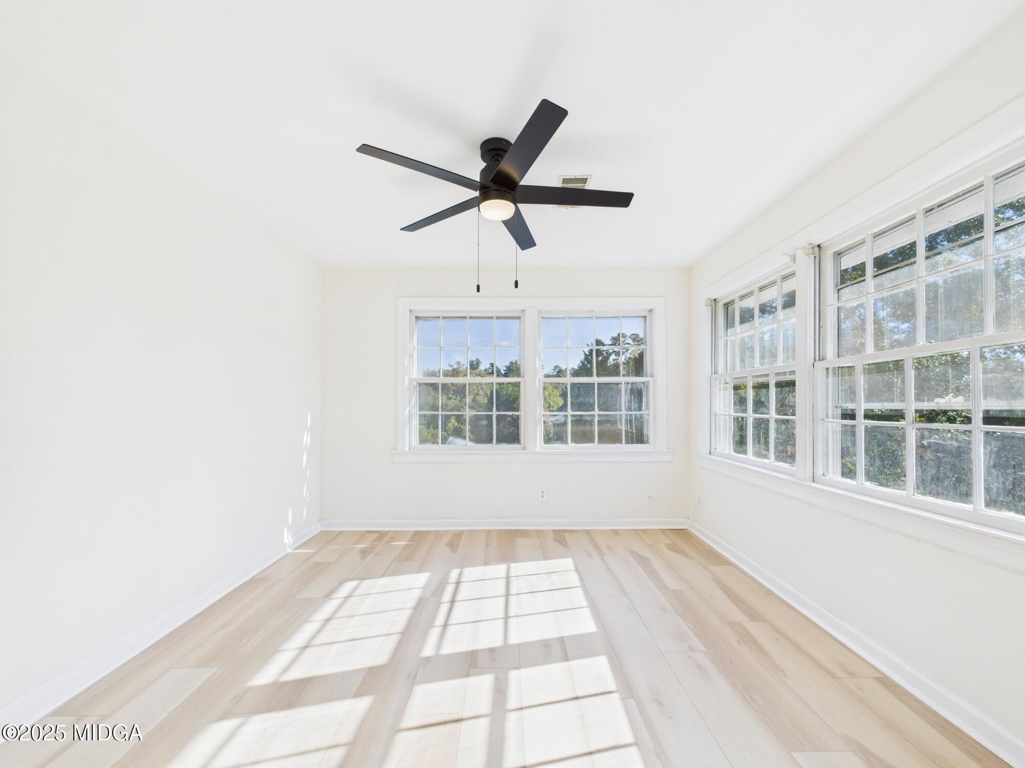 621 Forest Hill Road Macon, GA 31210 - Photo 33 of 50 a view of an empty room with a window