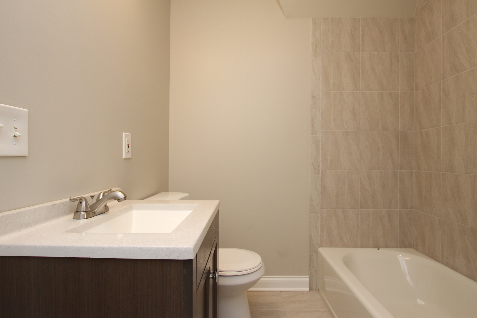 910 North Spring Street Elgin, IL 60120 - Photo 23 of 34 a bathroom with a sink and a toilet