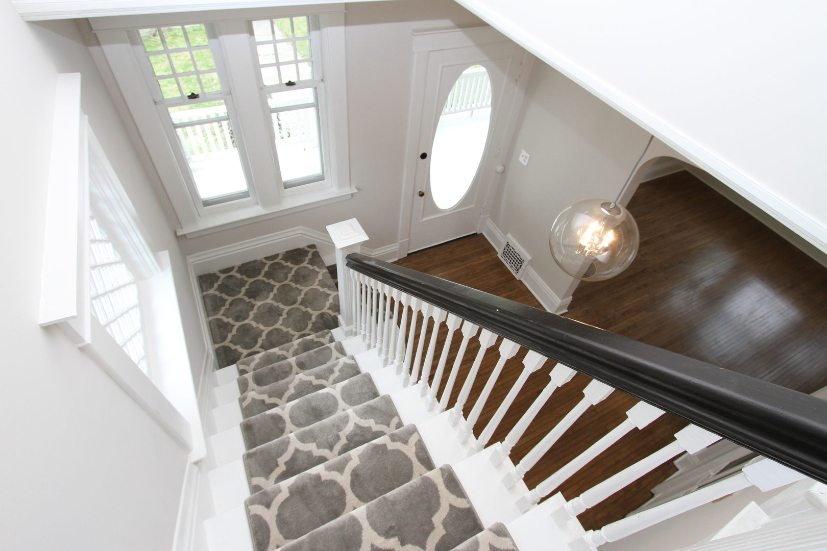 910 North Spring Street Elgin, IL 60120 - Photo 7 of 34 a view of an entryway with wooden floor