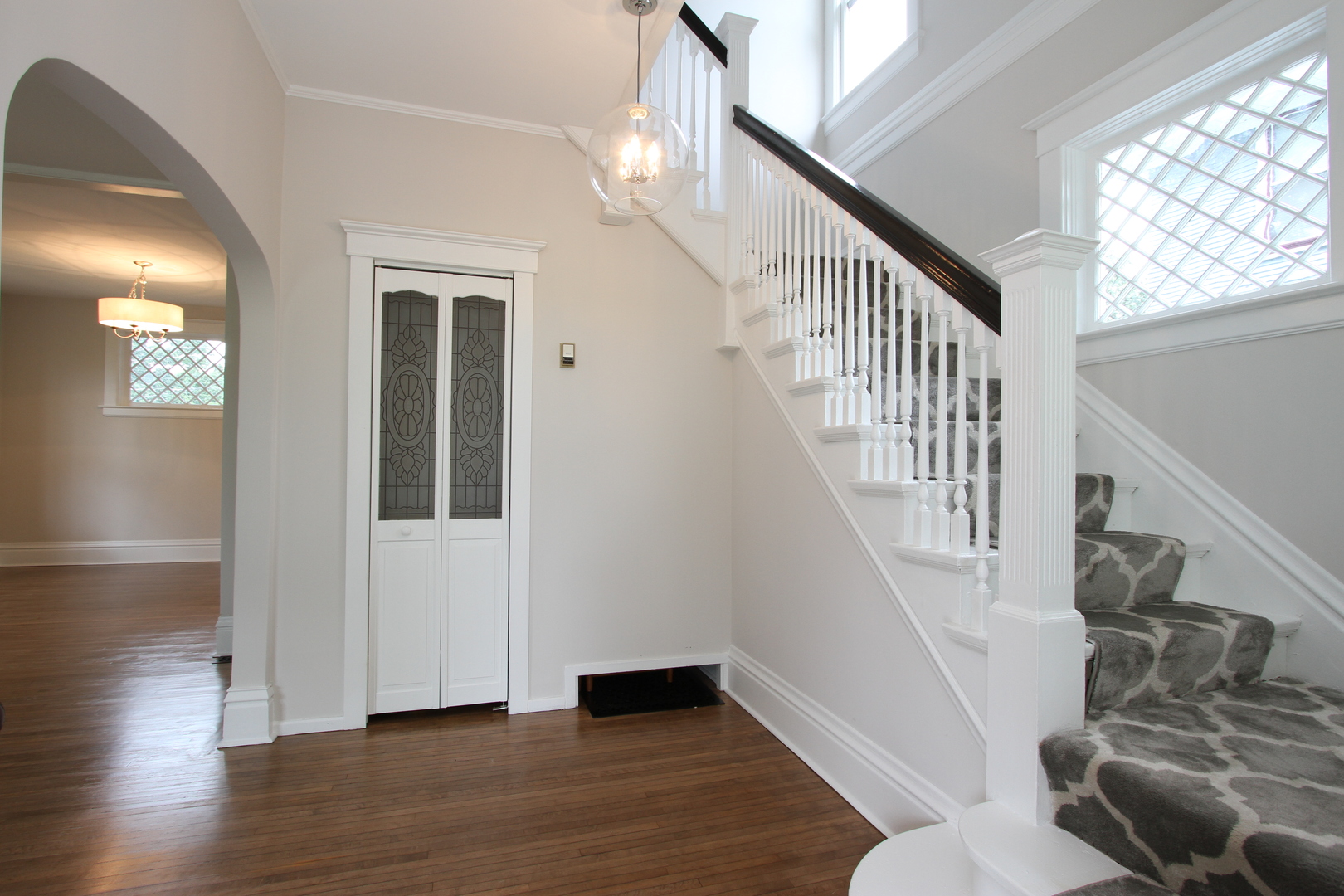 910 North Spring Street Elgin, IL 60120 - Photo 8 of 34 a view of entryway with wooden floor