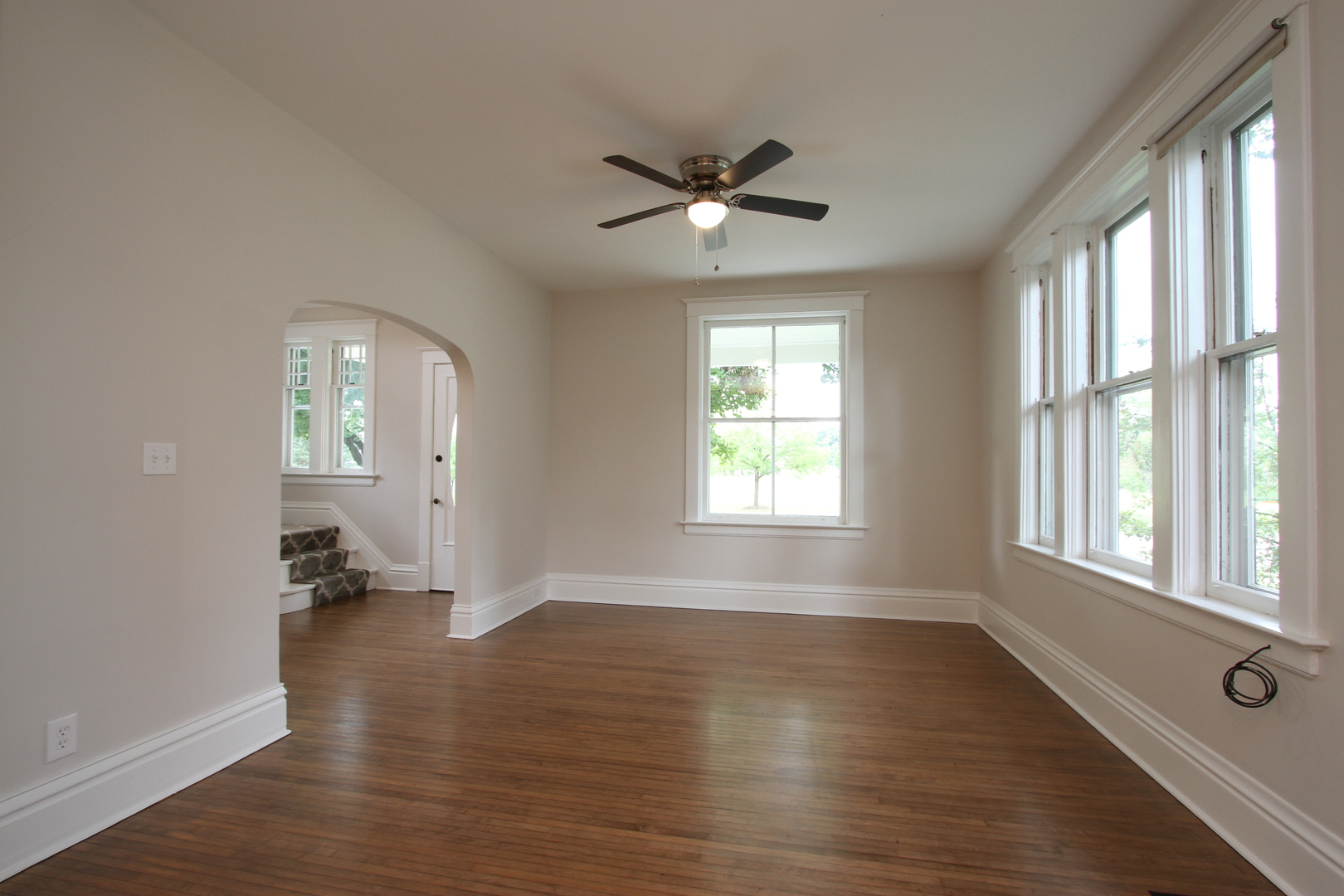 910 North Spring Street Elgin, IL 60120 - Photo 9 of 34 wooden floor in an empty room with a window