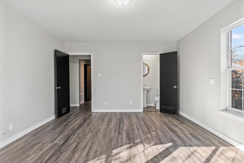 175 East Elm Street Canton, TX 75103 - Photo 18 of 25 wooden floor in an empty room with a window