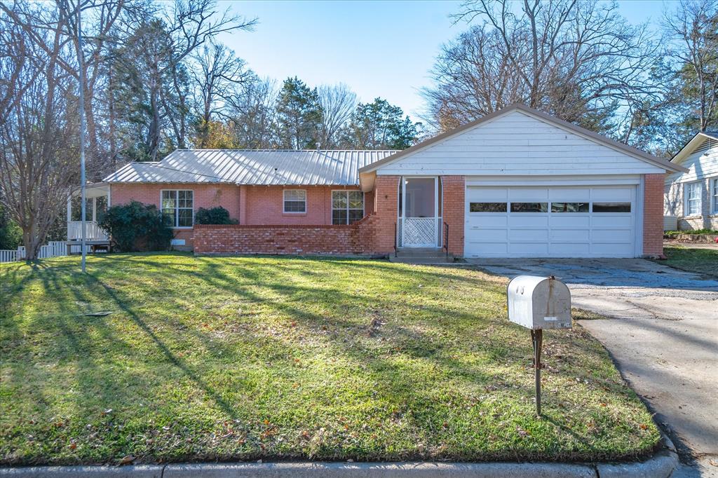 175 East Elm Street Canton, TX 75103 - Photo 25 of 25 a front view of a house with a yard