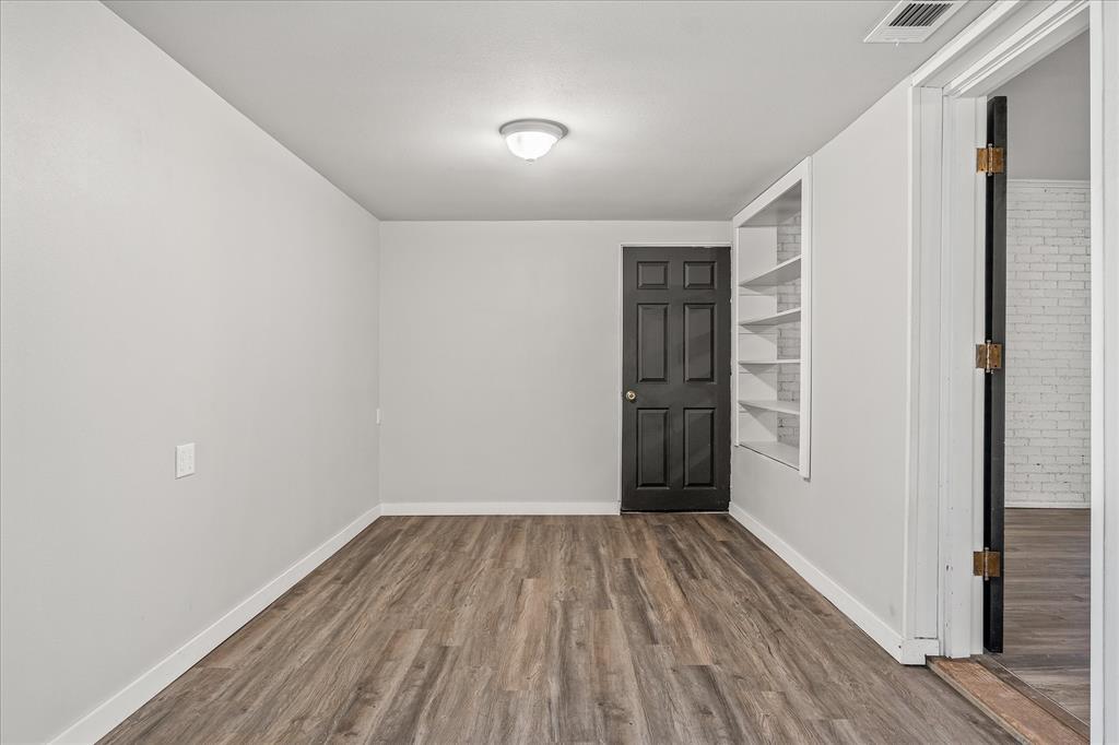 175 East Elm Street Canton, TX 75103 - Photo 7 of 25 a view of a room with wooden floor and entrance