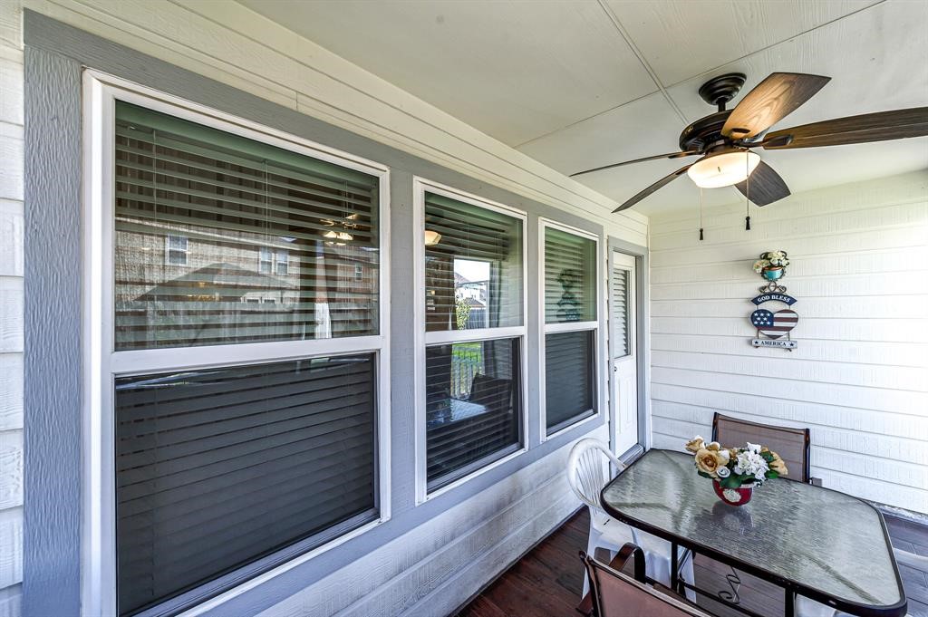 3203 Dale Ridge Trail Houston, TX 77084 - Photo 29 of 33 Alternate view of the enclosed patio, showcasing the large windows that look out into the yard.