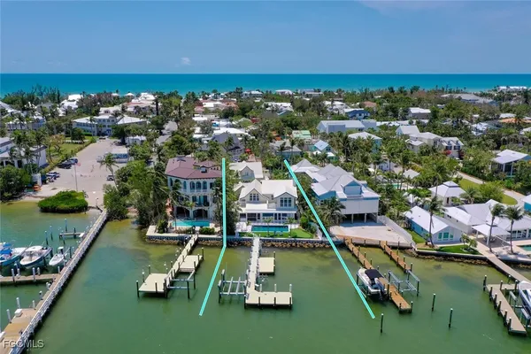 an aerial view of a house with a swimming pool