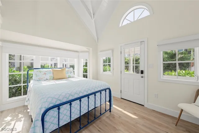 a front view of a house with a yard table and chairs